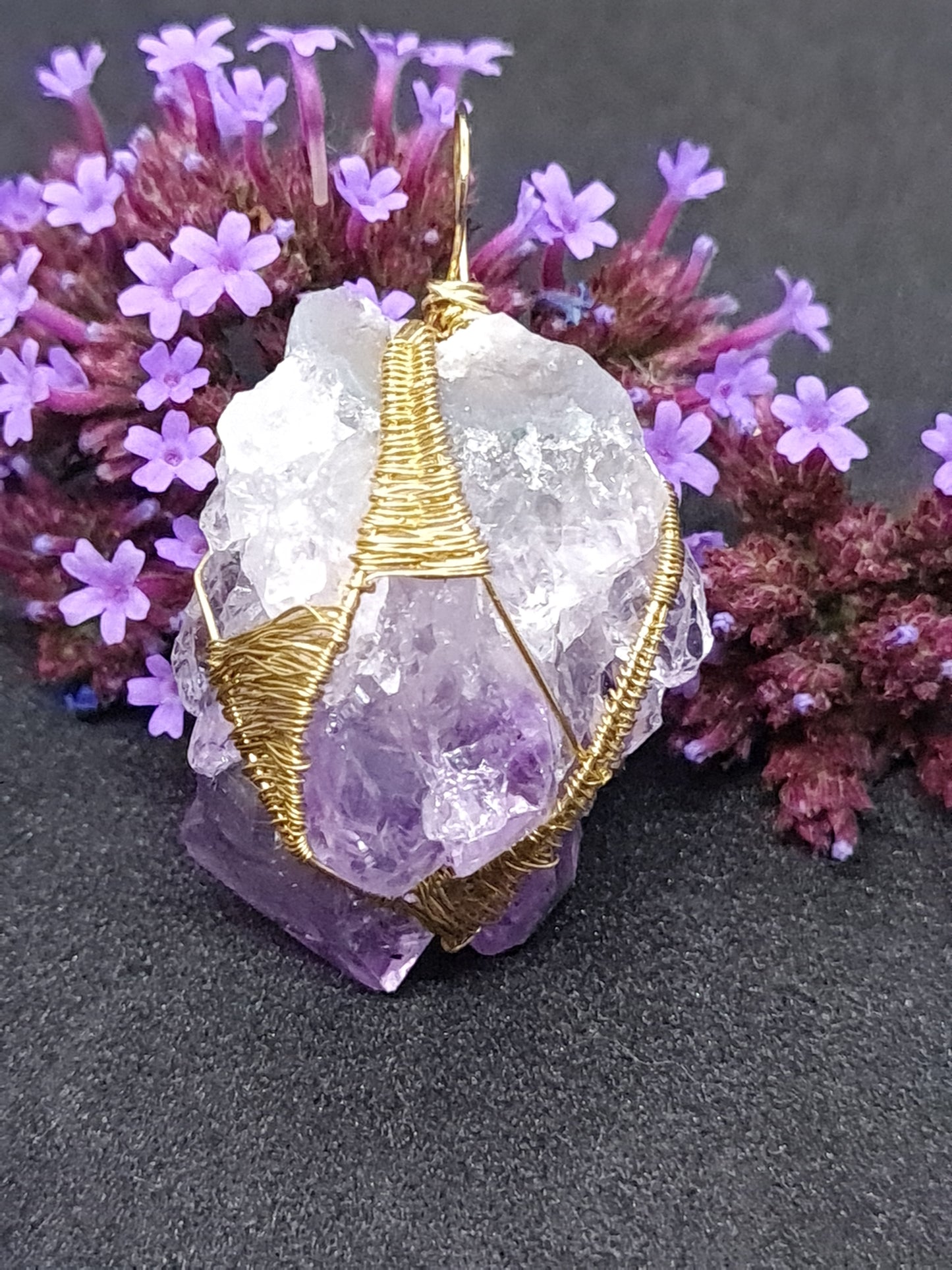 Rough Amethyst pendant wrapped in brass