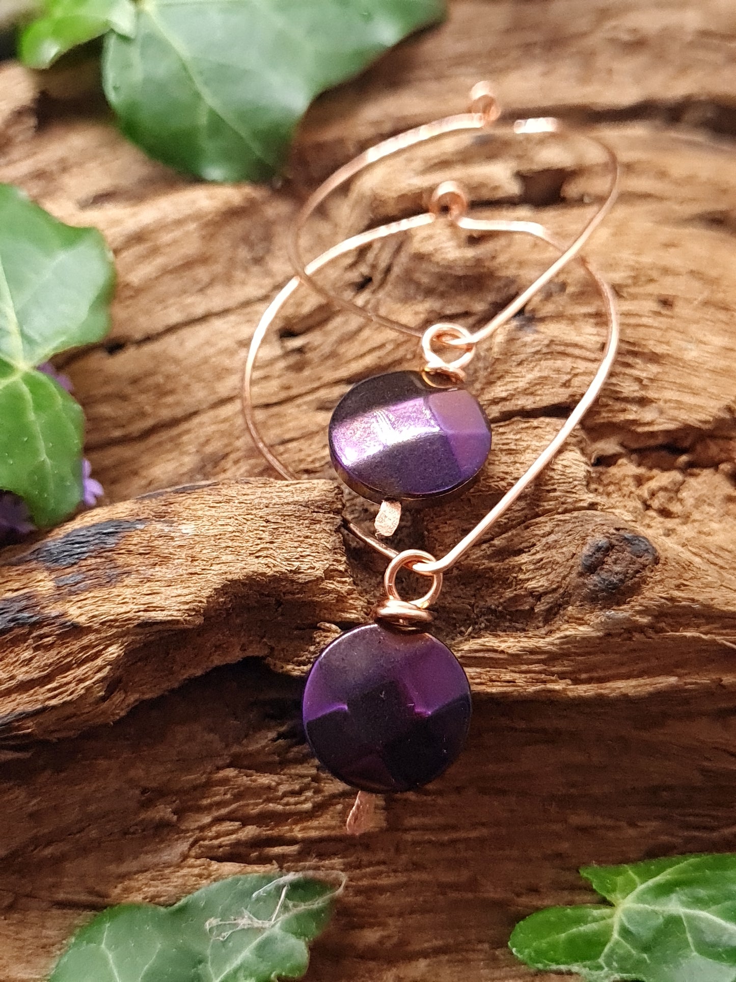 Copper hoops with purple Hematite stones