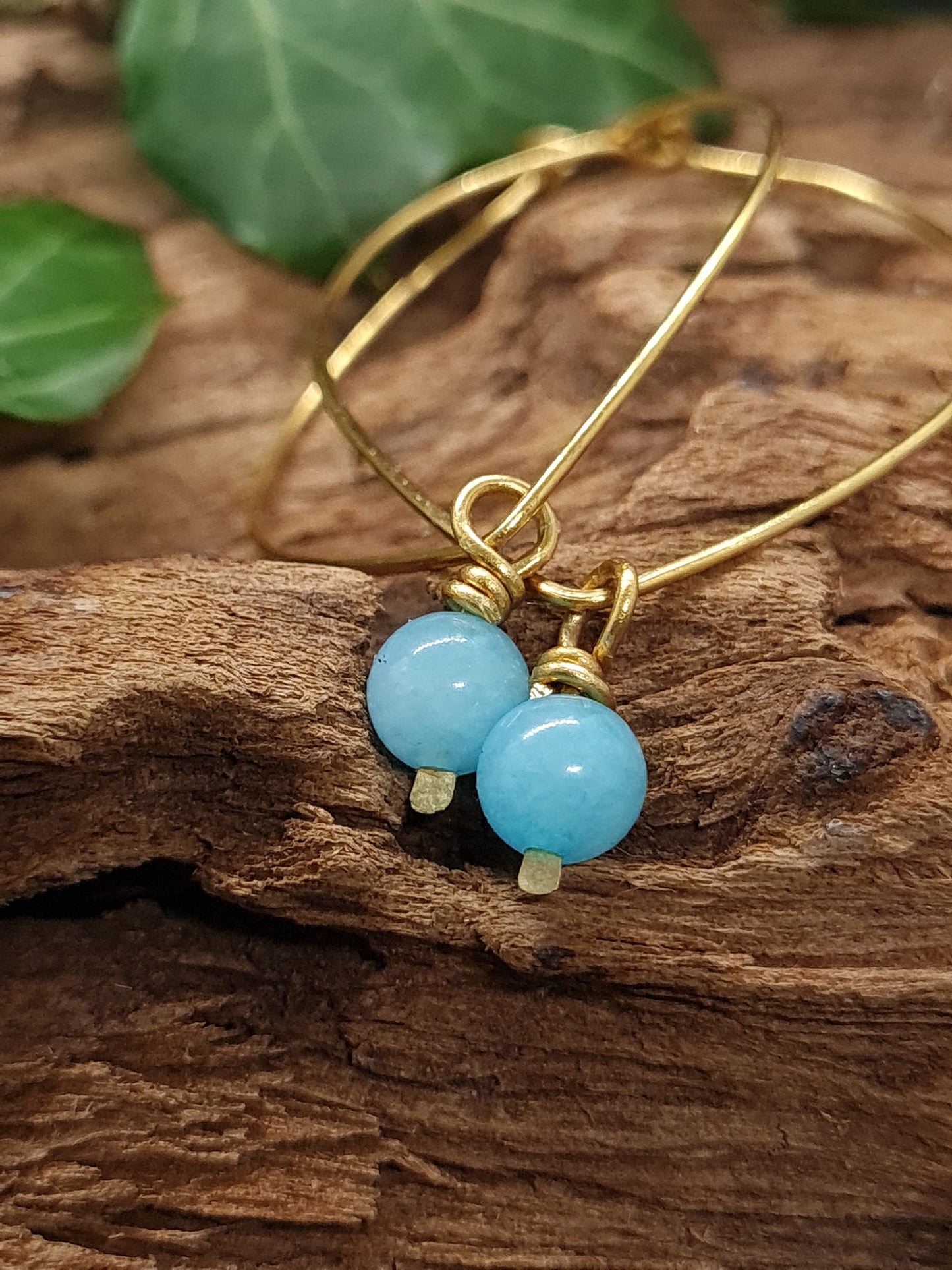 Brass hoops with Aquamarine stones